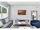 Well-designed living room showcasing comfortable seating, a modern TV, and stylish decor at 7770 Sandy Ridge Dr # 142, Kissimmee, FL 34747
