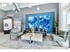 Inviting lobby area with modern furniture, cool-toned color scheme, and lots of natural light at 7770 Sandy Ridge Dr # 142, Kissimmee, FL 34747
