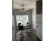 Cozy dining area with a modern table and chairs at 8121 Fan Palm Way, Kissimmee, FL 34747