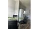 Charming dining area with modern chairs and granite countertops nearby at 8121 Fan Palm Way, Kissimmee, FL 34747