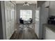 Eat-in kitchen featuring a round table, black chairs, and plenty of natural light at 8121 Fan Palm Way, Kissimmee, FL 34747