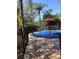 A fun community splash pad with vibrant colors, playful water features, and a secure fenced area at 8121 Fan Palm Way, Kissimmee, FL 34747