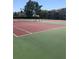 A well-maintained tennis court with clear nets and visible court lines for recreational play at 8121 Fan Palm Way, Kissimmee, FL 34747