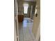 Bathroom featuring a double vanity, a separate shower, a garden tub, tile flooring, and a glass block window at 852 Adour Dr, Kissimmee, FL 34759