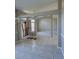 Open dining room with a tile floor, chandelier, and lots of natural light at 852 Adour Dr, Kissimmee, FL 34759