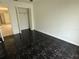 Bedroom featuring tile floors and a closet at 925 Derbyshire Dr, Kissimmee, FL 34758