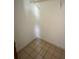 This closet features tiled flooring and a wire rack at 925 Derbyshire Dr, Kissimmee, FL 34758