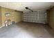Spacious garage with an automatic door at 925 Derbyshire Dr, Kissimmee, FL 34758