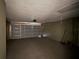 Spacious garage with an automatic door at 925 Derbyshire Dr, Kissimmee, FL 34758