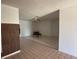 Open floor plan showing tile floors and a ceiling fan at 925 Derbyshire Dr, Kissimmee, FL 34758