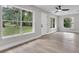 Bright and airy living room with lots of natural light and views of the landscaped yard at 9905 Nicoma Ln, Orlando, FL 32817