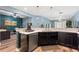 This kitchen features a dishwasher and a view into an adjacent living area at 1064 Quaker Ridge Ln, Davenport, FL 33896