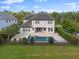 This is a gorgeous home featuring a beautiful pool, a spacious patio, and a well manicured lawn at 10950 Belle Maisons Dr, Orlando, FL 32832