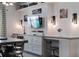 Bonus room featuring custom built-ins, shelving, and industrial-style table at 10950 Belle Maisons Dr, Orlando, FL 32832