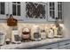 Kitchen countertop featuring modern appliances and stylish decor accents at 10950 Belle Maisons Dr, Orlando, FL 32832