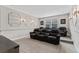 A cozy home theater room with tiered seating and plush reclining chairs for entertainment at 10950 Belle Maisons Dr, Orlando, FL 32832