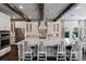 Bright kitchen with a large island, modern appliances, and hardwood floors at 10950 Belle Maisons Dr, Orlando, FL 32832