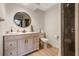 Stylish bathroom featuring a vanity, modern fixtures, and a glass-enclosed shower at 11951 Elbert St, Clermont, FL 34711