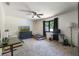 Bedroom with two beds and dark furnishings at 11951 Elbert St, Clermont, FL 34711