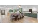 Bright, open-concept kitchen with a large island, modern appliances, and sleek countertops at 11951 Elbert St, Clermont, FL 34711