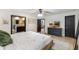 Bright main bedroom with ensuite bathroom at 11951 Elbert St, Clermont, FL 34711