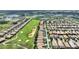 Aerial view showcasing the golf course community at 1353 Palmetto Dunes St, Davenport, FL 33836