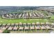 Aerial view of a home in a golf community at 1353 Palmetto Dunes St, Davenport, FL 33836