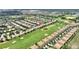 Elevated view featuring a golf course with lush greenery and stunning views at 1353 Palmetto Dunes St, Davenport, FL 33836