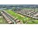 An aerial view of homes located along the golf course at 1353 Palmetto Dunes St, Davenport, FL 33836