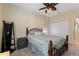 Comfortable bedroom featuring a decorative ceiling fan and closet at 1353 Palmetto Dunes St, Davenport, FL 33836