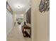 Hallway with art on the wall at 1353 Palmetto Dunes St, Davenport, FL 33836
