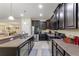 Large kitchen with stainless steel appliances and island at 1353 Palmetto Dunes St, Davenport, FL 33836