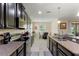 Spacious kitchen with stainless steel appliances and plenty of counter space at 1353 Palmetto Dunes St, Davenport, FL 33836