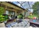 Outdoor patio with nice furniture and plants at 1353 Palmetto Dunes St, Davenport, FL 33836