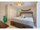 This bedroom features a comfortable bed, stylish decor, and ample closet space, creating a serene and inviting atmosphere at 1375 Springfield St, Kissimmee, FL 34744