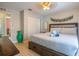 This bedroom features a comfortable bed, stylish decor, and ample closet space, creating a serene and inviting atmosphere at 1375 Springfield St, Kissimmee, FL 34744