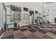 Community gym featuring various weight machines, fitness equipment, and natural light from large windows at 1379 Kiawah St, Celebration, FL 34747