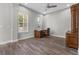 Office/study room with built-in desk and cabinets, ceiling fan, and natural light at 1379 Kiawah St, Celebration, FL 34747