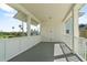 Covered porch features white columns and railings offering a relaxing outdoor space at 1379 Kiawah St, Celebration, FL 34747