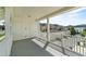 Covered porch features white columns and railings offering a relaxing outdoor space at 1379 Kiawah St, Celebration, FL 34747