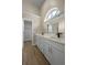 Spacious primary bathroom with dual vanity, quartz countertop, and modern fixtures at 14639 Musket Fire Ln, Orlando, FL 32837