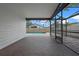 View of the screen enclosed patio overlooking the pool area that adds a relaxing ambiance at 14639 Musket Fire Ln, Orlando, FL 32837
