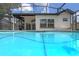 This private screened-in pool is perfect for relaxing and enjoying the sunshine in peace at 14639 Musket Fire Ln, Orlando, FL 32837