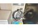 Garage featuring an EV charger station, water, and outlet at 148 Whirlaway Dr, Davenport, FL 33837