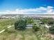 Expansive aerial view of home and large lot, showcasing the surrounding community at 15311 Johns Lake Rd, Clermont, FL 34711