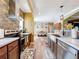 Bright, stylish kitchen featuring modern appliances and sleek countertops with lots of space at 15311 Johns Lake Rd, Clermont, FL 34711