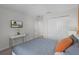 Relaxing bedroom featuring a warm bed, modern decor and lots of natural light at 1565 Plunker Dr, Davenport, FL 33896