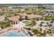 Aerial view of community center with pool, lounge area, playground and clubhouse at 1578 Slice Way, Davenport, FL 33896