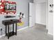 Bedroom space with Mickey Mouse decor, a desk and a TV at 1578 Slice Way, Davenport, FL 33896