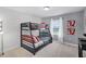 Themed bedroom with a bunk bed and playful decor accents at 1578 Slice Way, Davenport, FL 33896